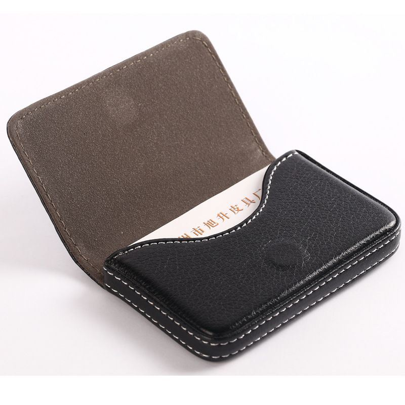 حامل بطاقة أعمال من الجلد الصن - مراجعة Travel Wallet Slim وسعره