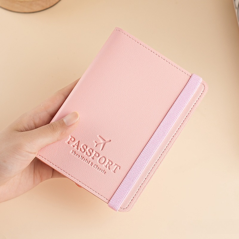 غطاء جواز سفر من الجلد الصناعي - مراجعة Travel Wallet Slim وسعره